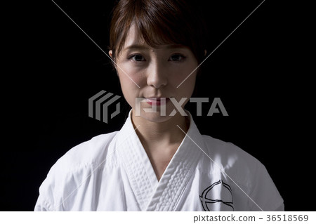Female karate image black background Female karate image black background 36518569
