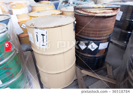 Chemical waste dumped in rusty barrels 36518784