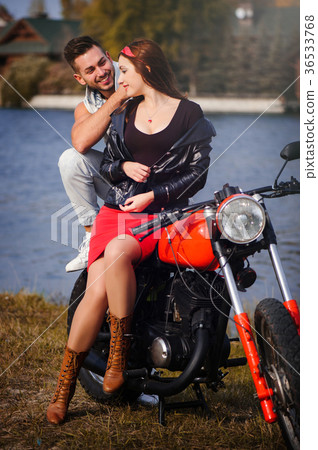 stylish and trendy couple in love on a motorcycle 36533768