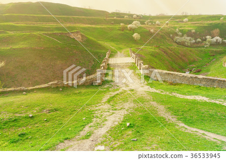 Antique old roman stones bridge. 36533945