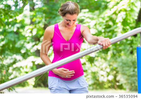 Pregnant woman doing pregnancy exercises on Pregnant woman doing pregnancy exercises on 36535094