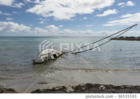 capsized sailboat on Guadeloupe capsized sailboat on Guadeloupe 36535593
