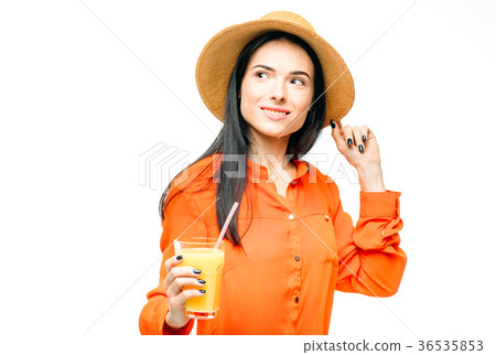 Woman drinks fresh juice fruit, white background 36535853