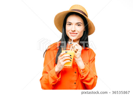 Woman drinks fresh juice fruit, white background 36535867