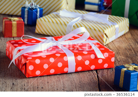 Gift Box Present and decorate on a wooden table Gift Box Present and decorate on a wooden table 36536114