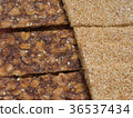 Sweet snack bar with peanuts and sesame seeds 36537434