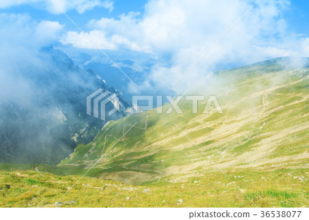 A panoramic view to canyon between a chain A panoramic view to canyon between a chain 36538077