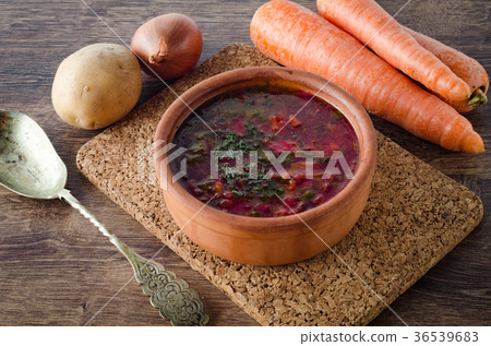 Bowl of traditional soup Borscht on table 36539683