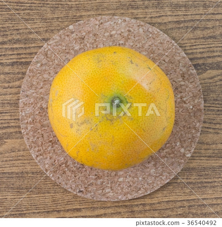 Four Fresh Oranges on A Wooden Board Four Fresh Oranges on A Wooden Board 36540492