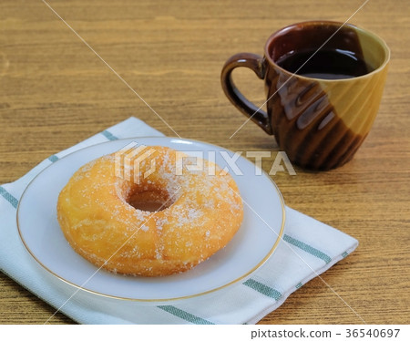 Glazed Donut with Sugar Served with Tea 36540697