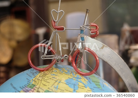 Mini Bicycle on Model of The Globe of Earth Mini Bicycle on Model of The Globe of Earth 36540860