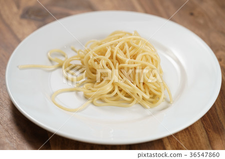 spaghetti on white plate on table spaghetti on white plate on table 36547860