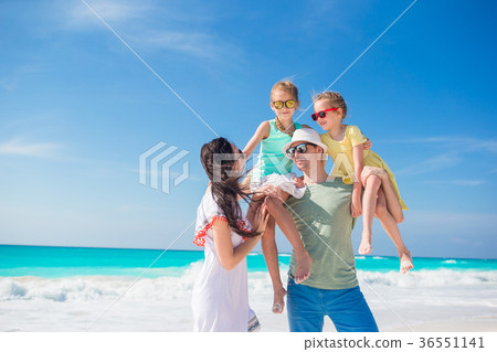 Portrait of family on the beach. Family summer Portrait of family on the beach. Family summer 36551141