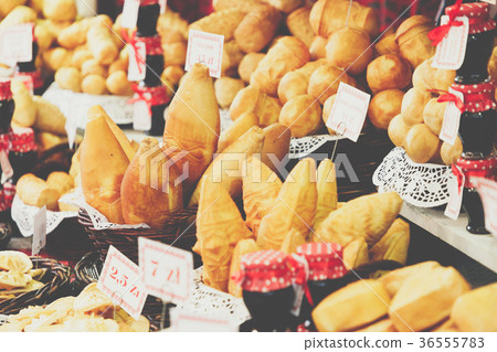 Traditional polish smoked cheese oscypek on market Traditional polish smoked cheese oscypek on market 36555783