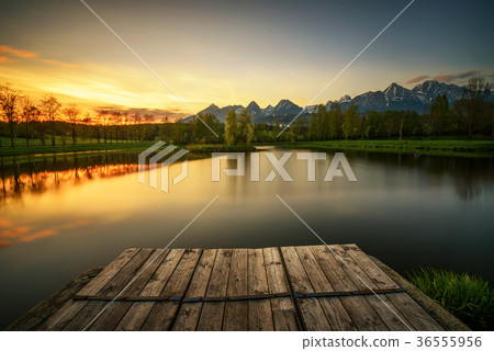 Sunset above a lake in high tatra mountains in Sunset above a lake in high tatra mountains in 36555956