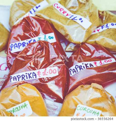 Many different colorful spices, nuts, dried fruits 36556264