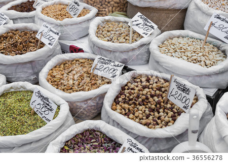 Many different colorful spices, nuts, dried fruits Many different colorful spices, nuts, dried fruits 36556278