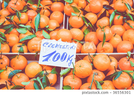 Background of the fresh mandarins with leaves Background of the fresh mandarins with leaves 36556301