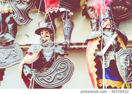 Some Sicilian puppets with their typical brassy Some Sicilian puppets with their typical brassy 36556422