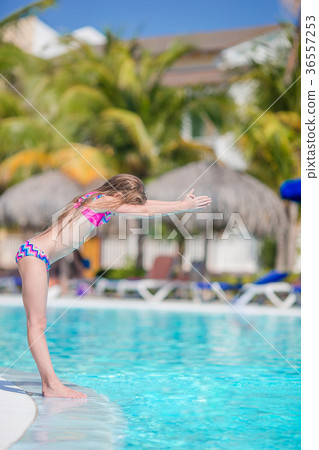 Little active adorable girl in outdoor swimming Little active adorable girl in outdoor swimming 36557253