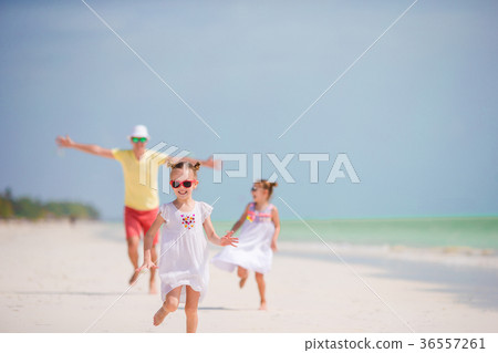 Young family on vacation have a lot of fun Young family on vacation have a lot of fun 36557261