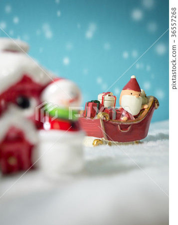 Happy Santa Claus with gifts box on the snow sled 36557268