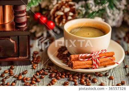 Cozy winter setting with cup of coffee 36557326