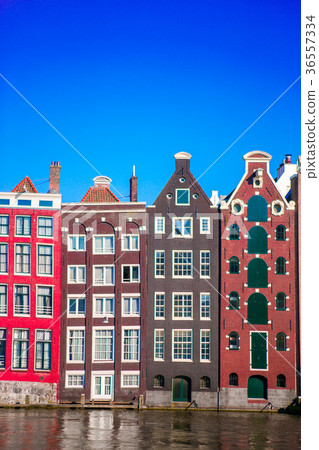 Traditional dutch medieval houses in Amsterdam Traditional dutch medieval houses in Amsterdam 36557334