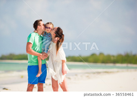 Young family on beach vacation 36558461