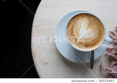 cup of freshly brewed coffee, cappuccino in cafe cup of freshly brewed coffee, cappuccino in cafe 36558463