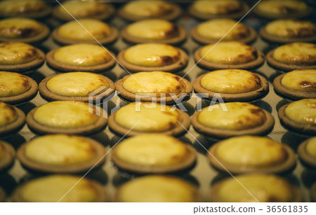 Delicious Chinese egg tart on the paper in store Delicious Chinese egg tart on the paper in store 36561835