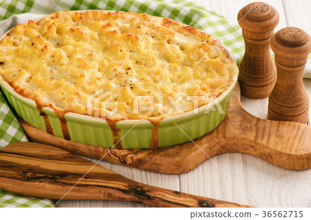 Macaroni and cheese, traditional american food. Macaroni and cheese, traditional american food. 36562715
