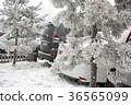 car in the snow. snowy winter 36565099