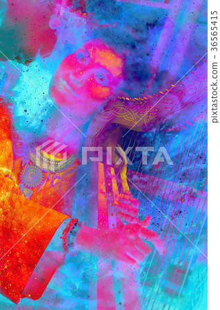 girl harpist in white dress with jewels playing 36565415