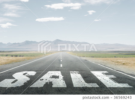 Sale word on asphalt road 36569243