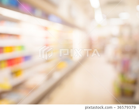 Blurred supermarket pass with colorful shelves as Blurred supermarket pass with colorful shelves as 36579379
