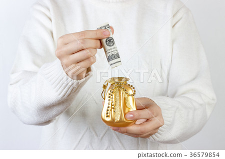Close-up Of A Woman Holding Gift Box Of Dollar Close-up Of A Woman Holding Gift Box Of Dollar 36579854