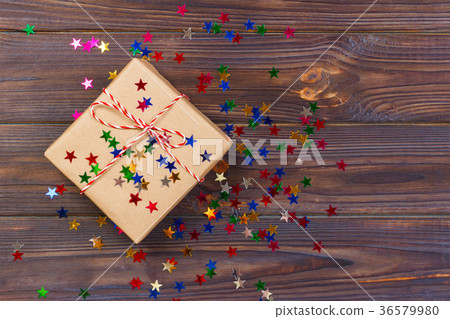 Simple christmas gift with red twine, decorstars Simple christmas gift with red twine, decorstars 36579980