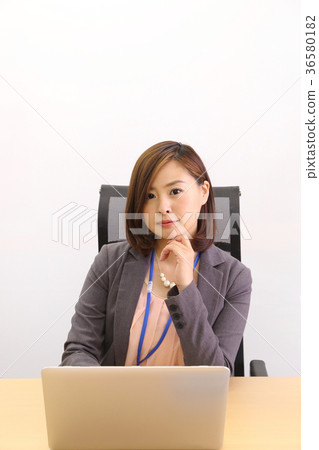 PC typing woman 36580182