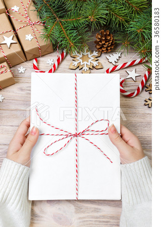 Top view of christmas letter in hand. Close up Top view of christmas letter in hand. Close up 36580183