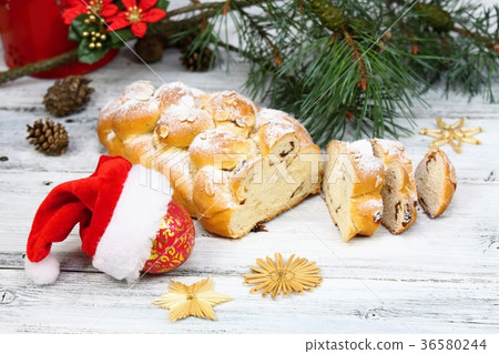 Christmas stollen with powdered sugar Christmas stollen with powdered sugar 36580244