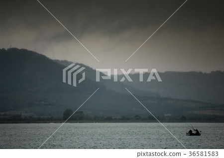 Storm and Rain over lake, France 36581583