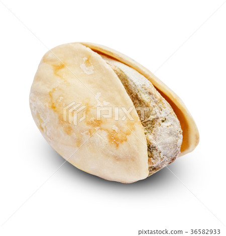 Roasted pistachio nut isolated on white background 36582933