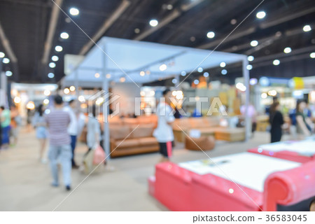 blurred people walking in shopping center blurred people walking in shopping center 36583045