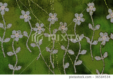 Stylized white wild flowers and leaves on green Stylized white wild flowers and leaves on green 36584534