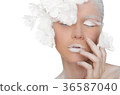 portrait of a young woman with a winter make-up 36587040