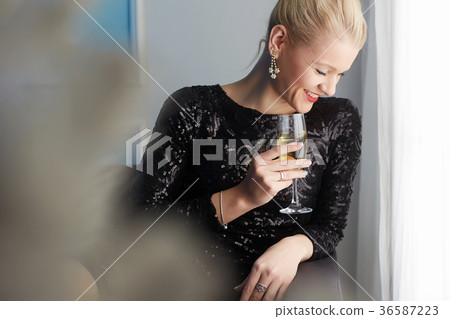 happy smiling woman at home.drinking champagne happy smiling woman at home.drinking champagne 36587223