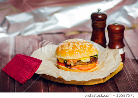 Burger with beef on wooden background with Burger with beef on wooden background with 36587575