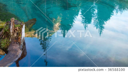Amazing blue geyser lake in the mountains of Altai 36588100