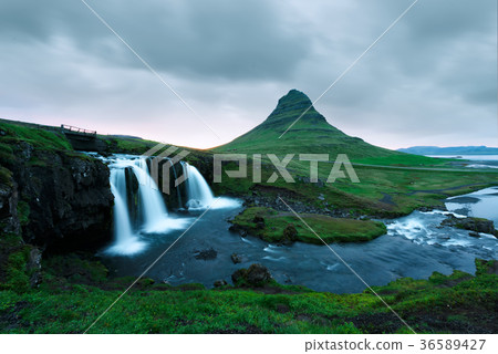 Colorful sunrise on Kirkjufellsfoss waterfall 36589427